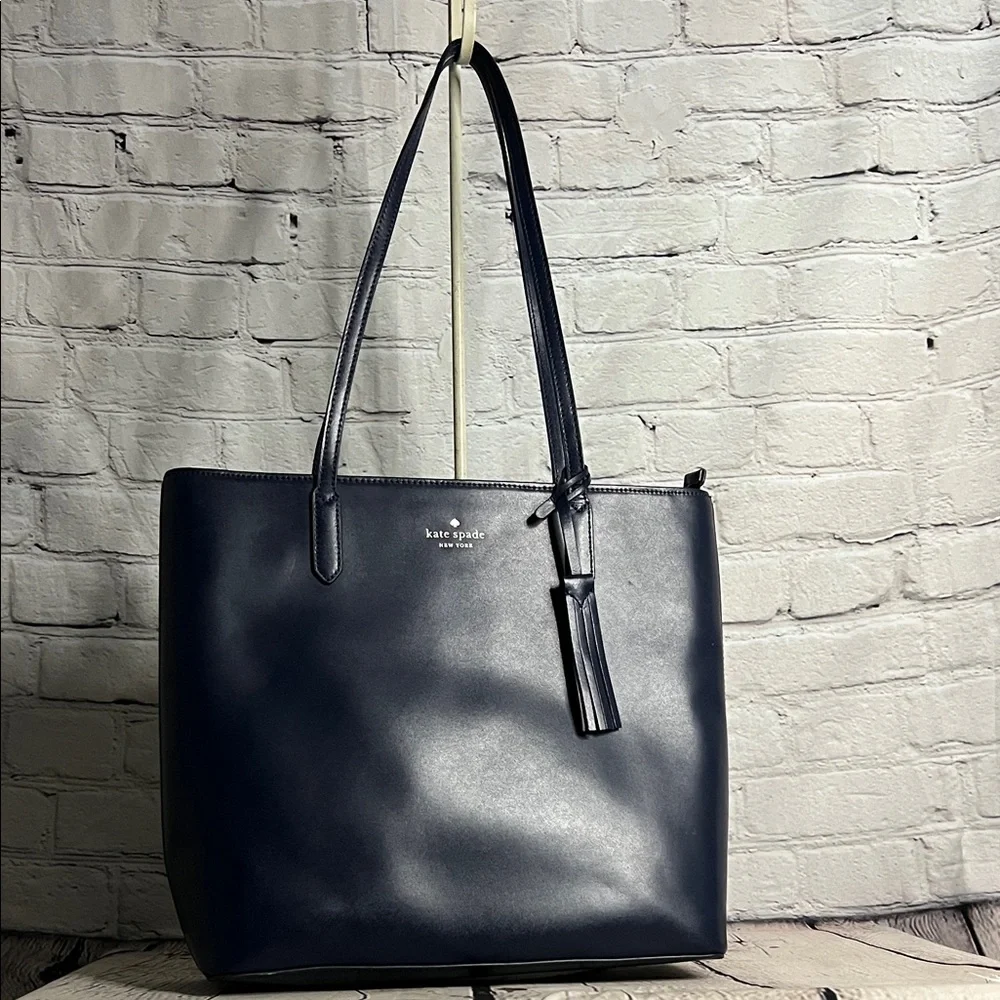 * Kate Spade New York Jana tote bag in navy smooth leather with a tassel detail